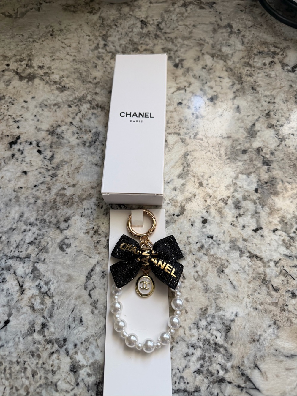 CHANEL Black Bow, Gold & Pearl Keychain Charm